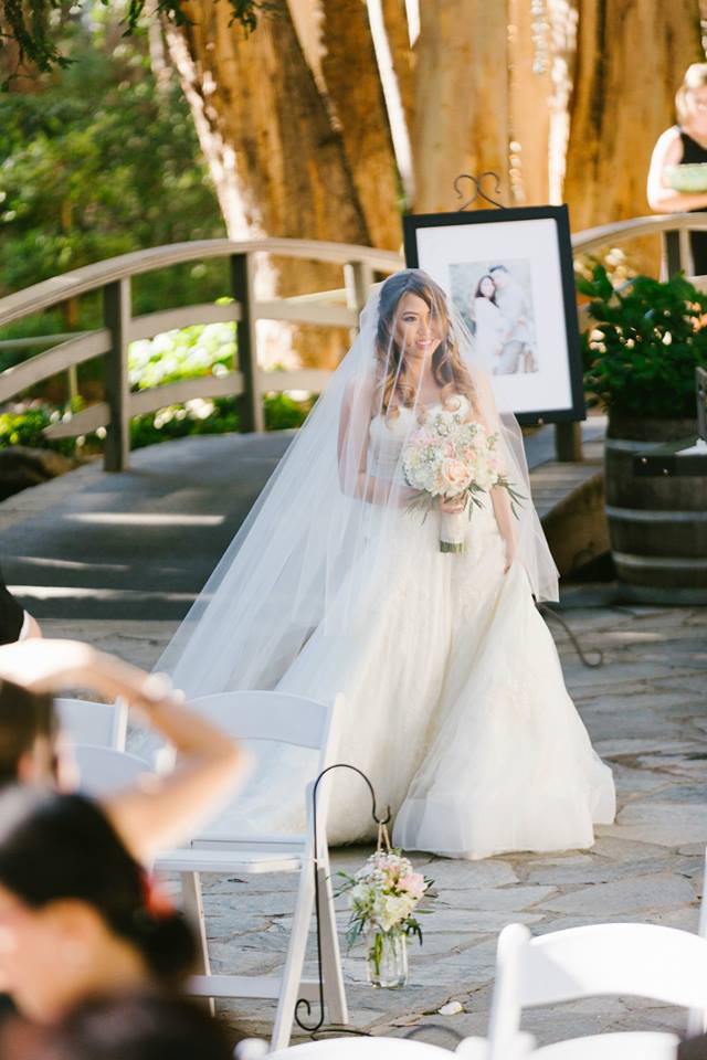 Rustic and elegant wedding at Calamigos Ranch in the Redwood room, ceremony bride walking down aisle