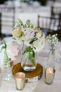 Rustic and elegant wedding at Calamigos Ranch in the Redwood room, reception with blush floral centerpiece