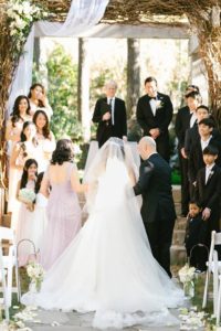 Rustic and elegant wedding at Calamigos Ranch in the Redwood room, ceremony