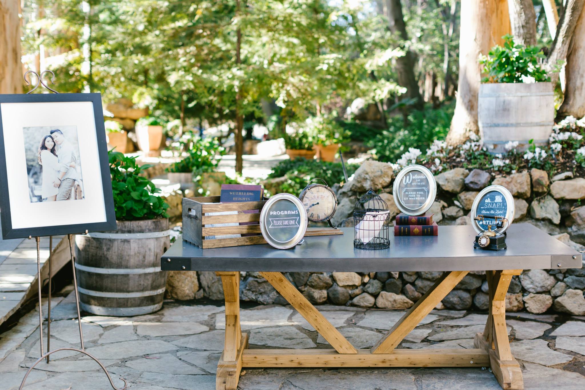 Rustic and elegant wedding at Calamigos Ranch in the Redwood room, welcome table with vintage details