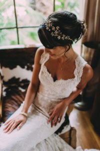 A garden wedding at Mermaid Mountain Inn, bridal updo with crystal headband, lace wedding dress