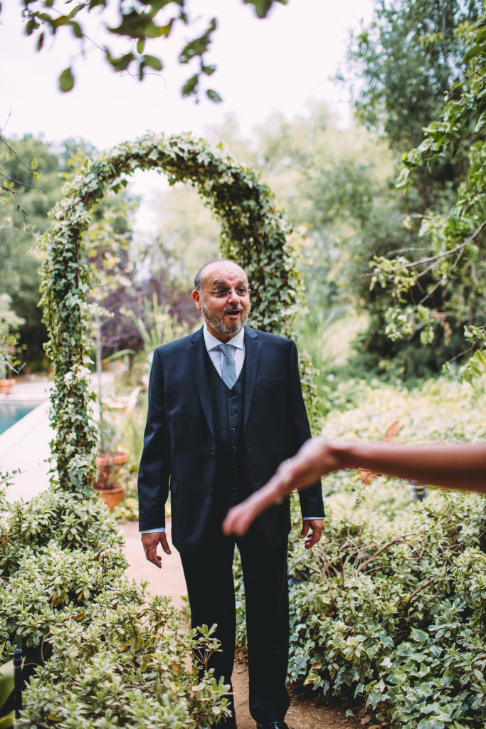 A garden wedding at Mermaid Mountain Inn, father of the bride first look