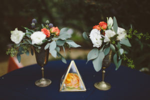 A garden wedding at Mermaid Mountain Inn, geometric centerpieces