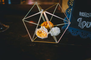 A garden wedding at Mermaid Mountain Inn, geometric flower vase