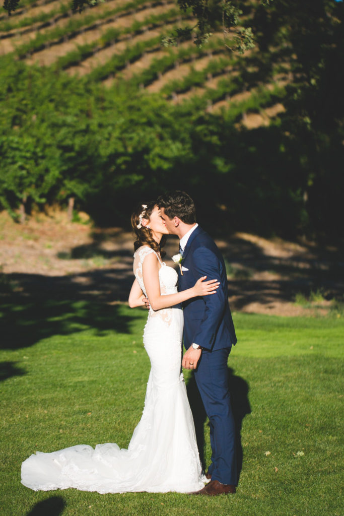 An intimate wedding at Triunfo Creek Vineyards, wedding ceremony, bride and groom first kiss