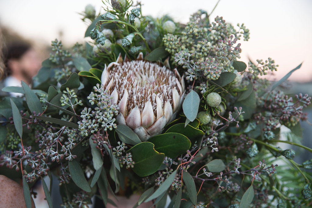 Unique wedding at Elysian LA, mixed greenery with king protea flower bridal bouquet