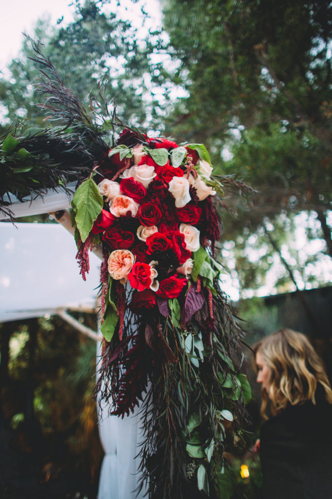 Fall Wedding at Calamigos Ranch ceremony chuppa with maroon and blush flowers