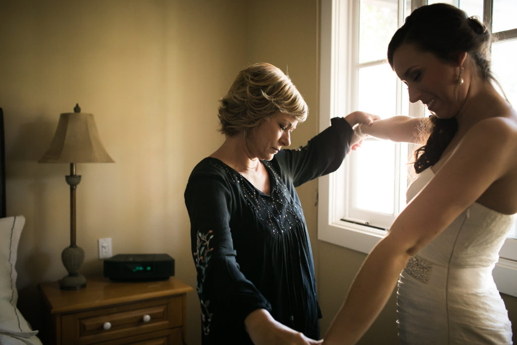 Classic and vintage wedding at Calamigos Ranch, bride getting ready with help from mom