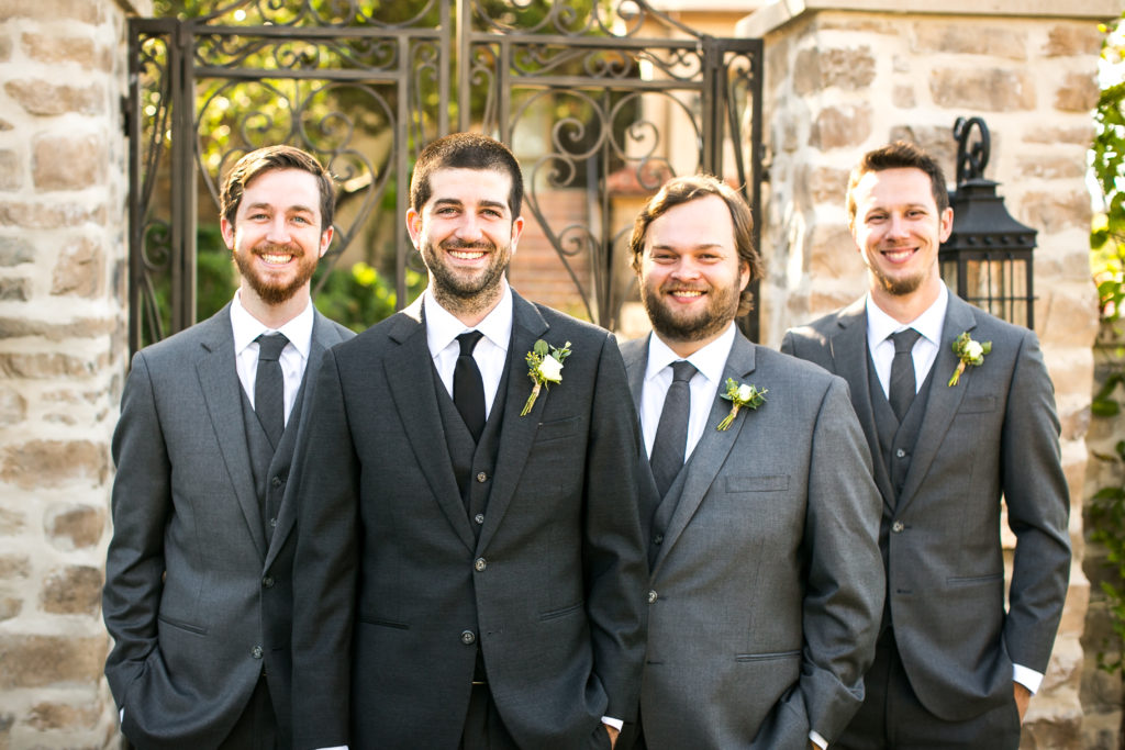 Classic and vintage wedding at Calamigos Ranch, groom and groomsmen grey suits