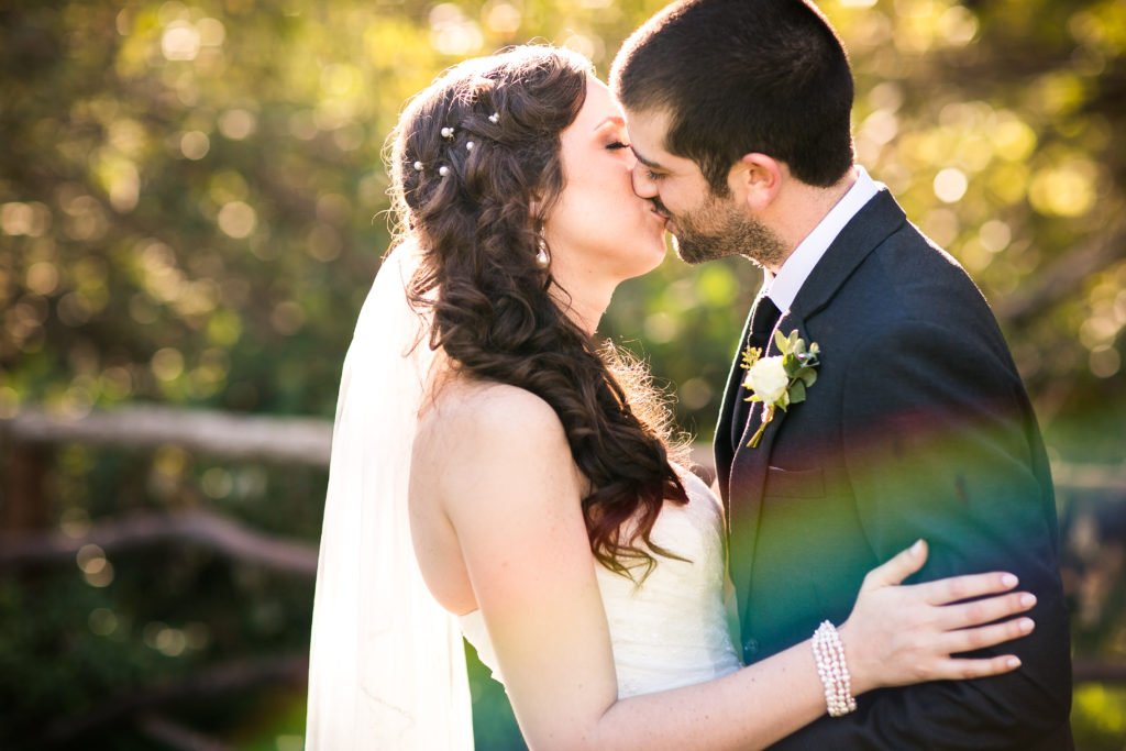 Classic and vintage wedding at Calamigos Ranch, bride and groom kiss