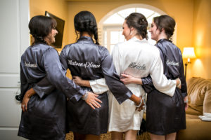 Classic and vintage wedding at Calamigos Ranch, bride and bridesmaid robes