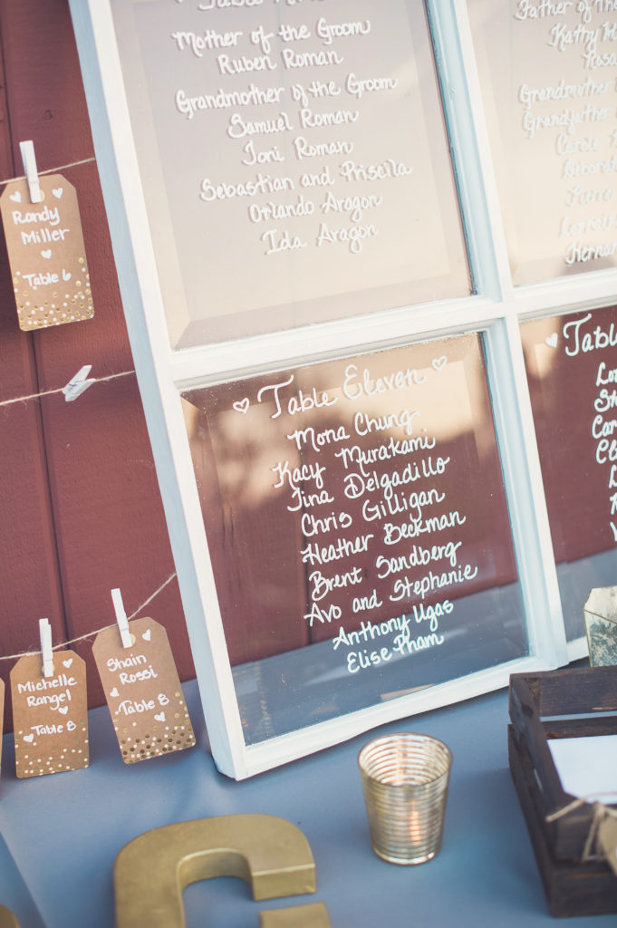 rustic window escort board for this soft and romantic wedding at strawberry farms golf course