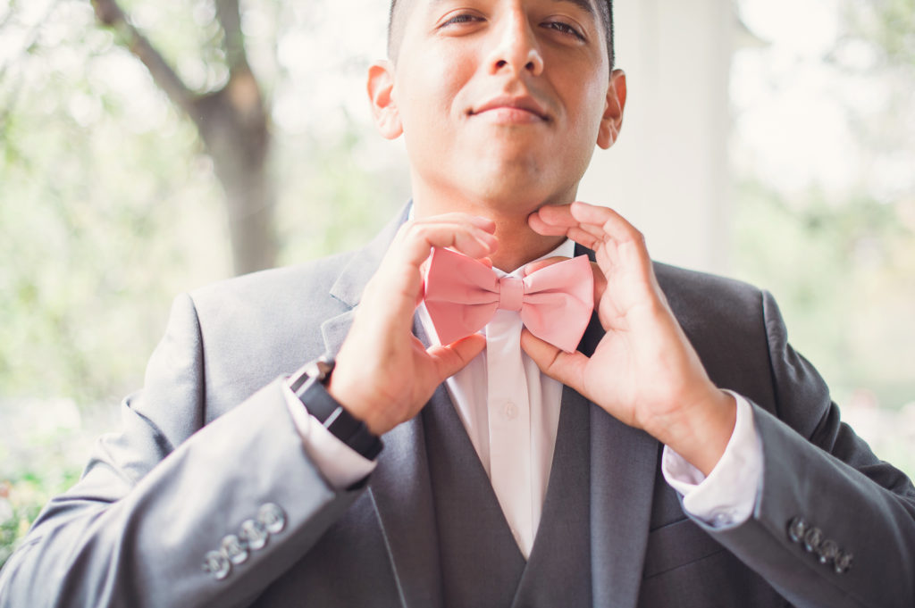 groom in pink tie
