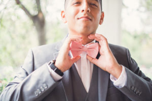 groom in pink tie