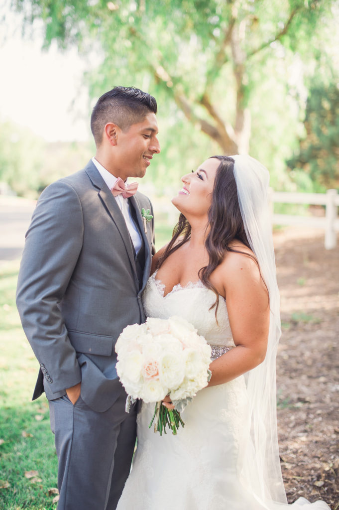 bride and groom portrait shot at this soft and romantic wedding at strawberry farms golf course