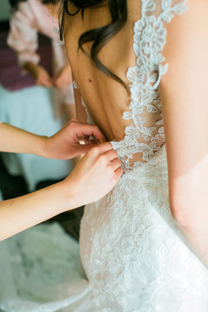 Modern and Chic wedding at Garland Hotel, bride getting ready in dress