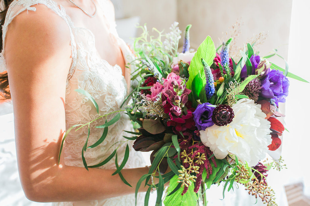 Modern and Chic wedding at Garland Hotel, bright bridal bouquet with purple flowers