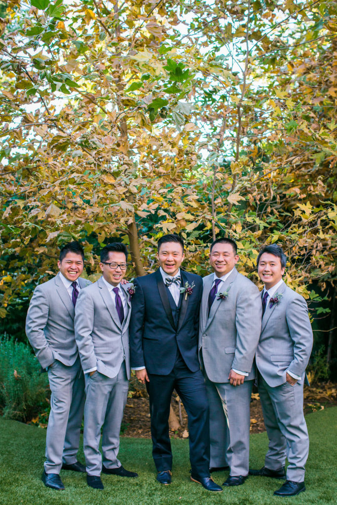 Modern and Chic wedding at Garland Hotel, groom and groomsmen wearing purple ties