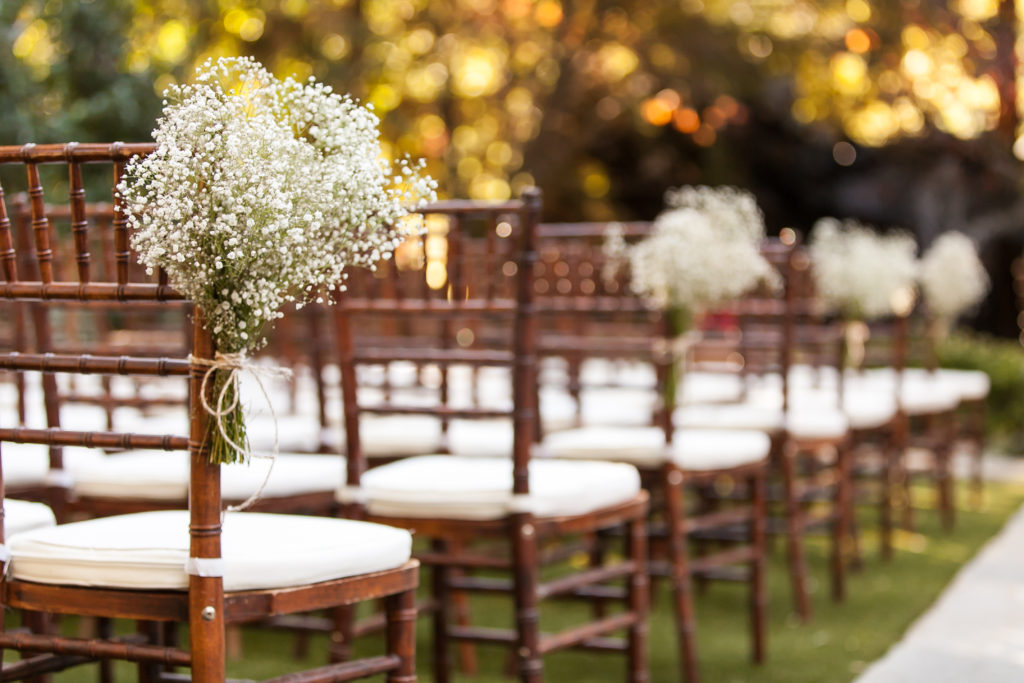 Classic and vintage wedding at Calamigos Ranch, baby's breath aisle flowers