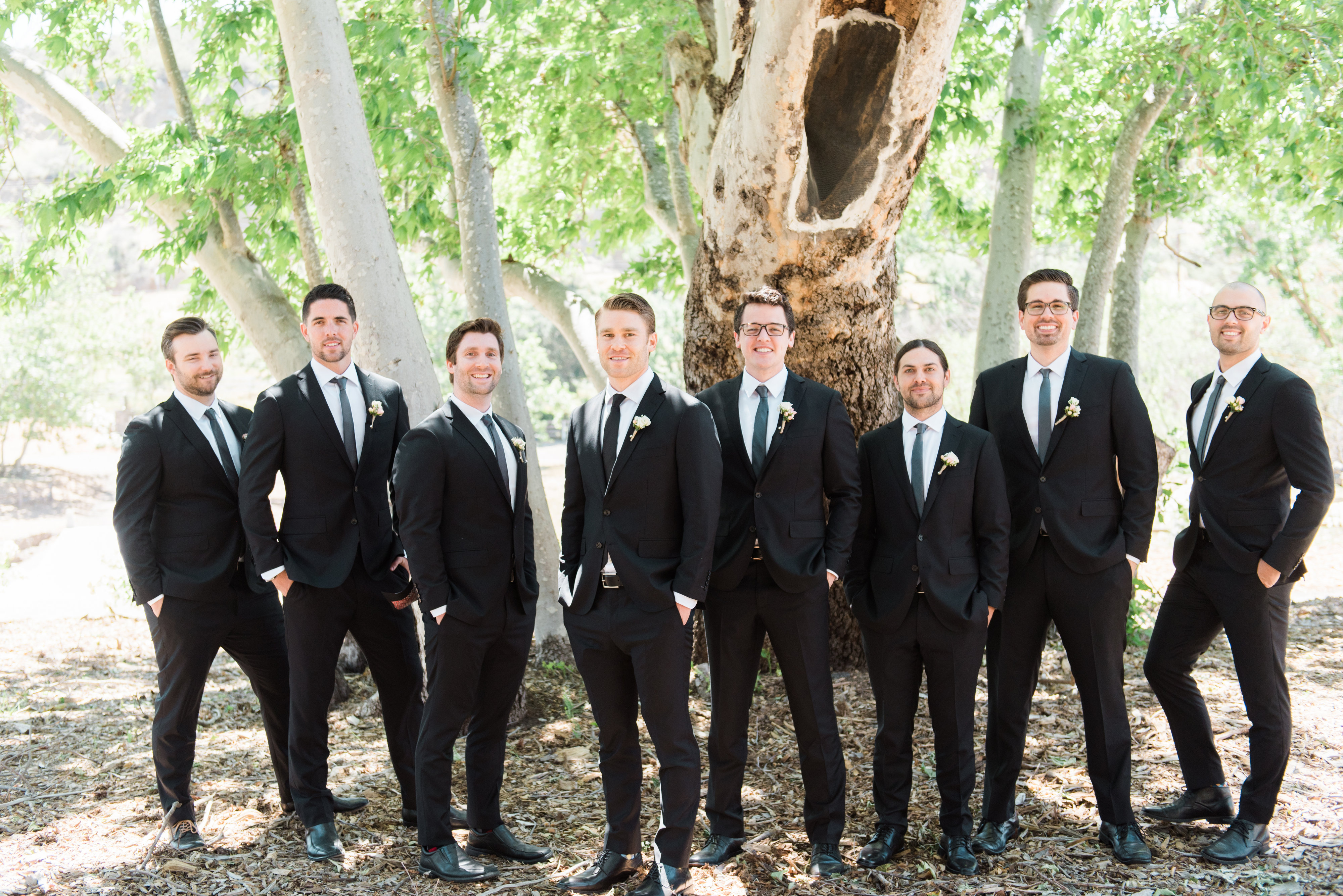 Trifuno Creek Vineyards wedding, groomsmen wearing black suits