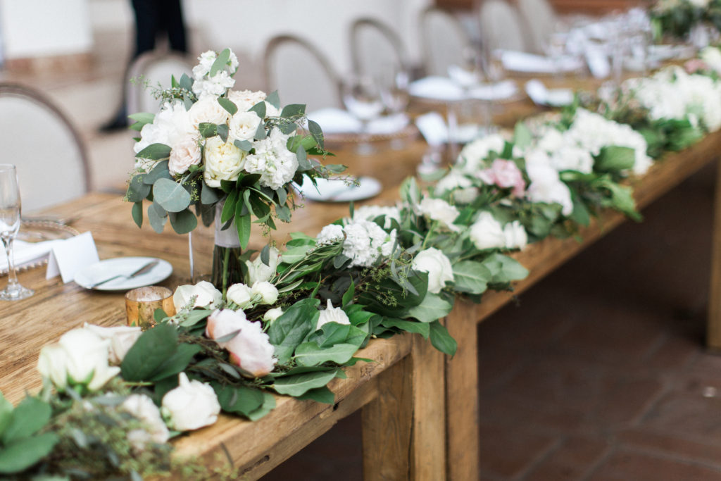 Rancho Las Lomas wedding reception, pink and white flower centerpieces