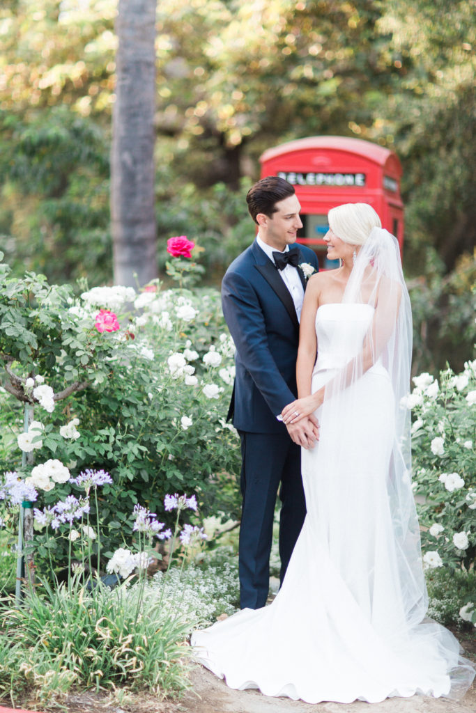 Rancho Las Lomas wedding, bride and groom portraits with red phone booth