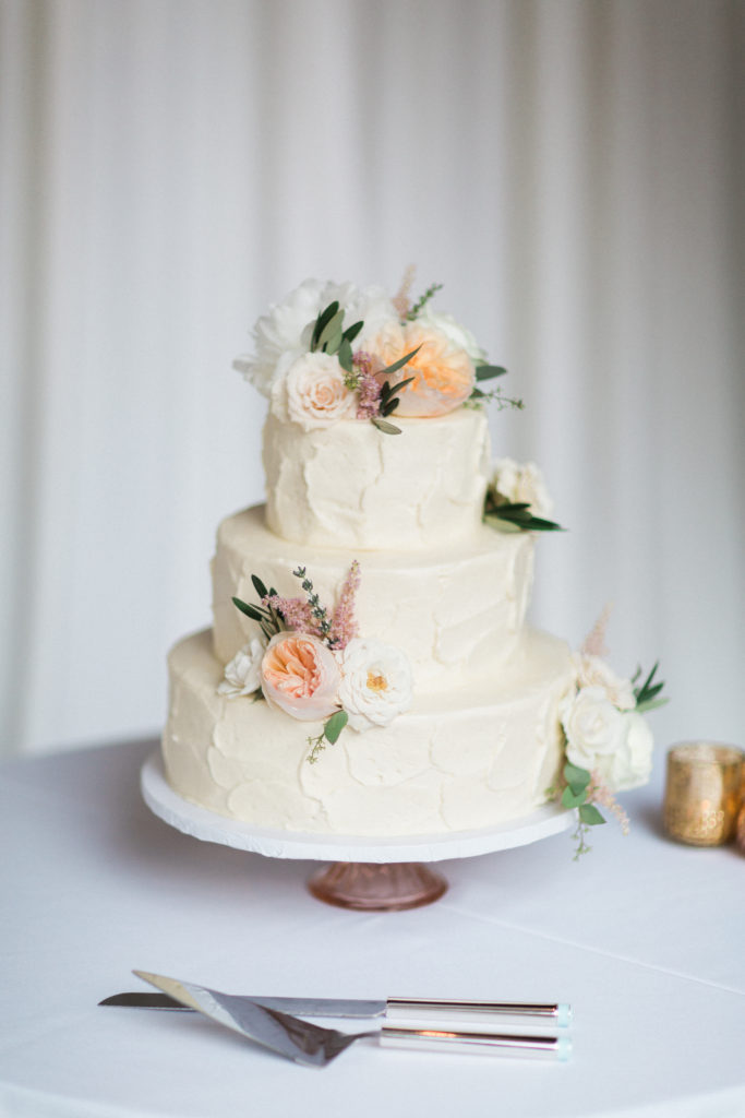 Rancho Las Lomas wedding reception, cake with flowers