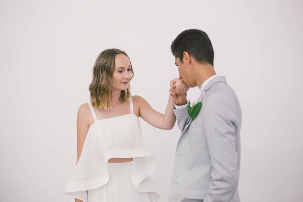 Pantone Color of 2017 inspired minimalist wedding at Hubble Studio in downtown Los Angeles, modern bride and groom, greenery boutonniere