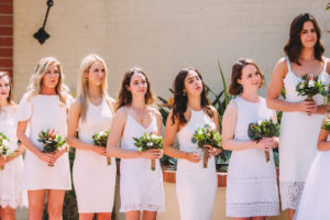 bridal party in all white dresses