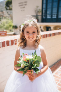 flower girl with small bouquet