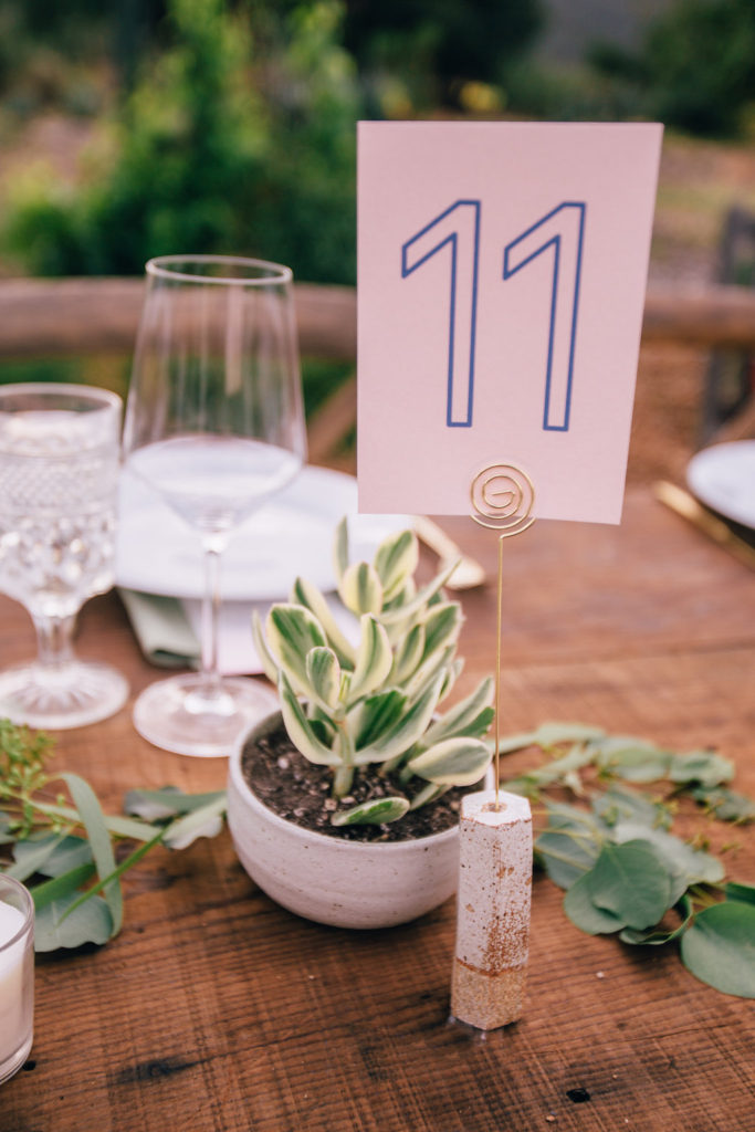 blue and pink table numbers
