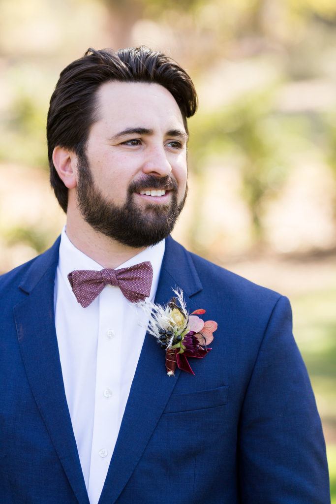 Navy Groom's suit with boutonniere