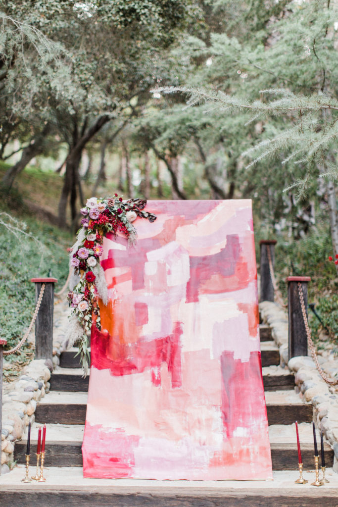 Semi-Monochromatic hand painted backdrop for wedding ceremony at Rancho Las Lomas