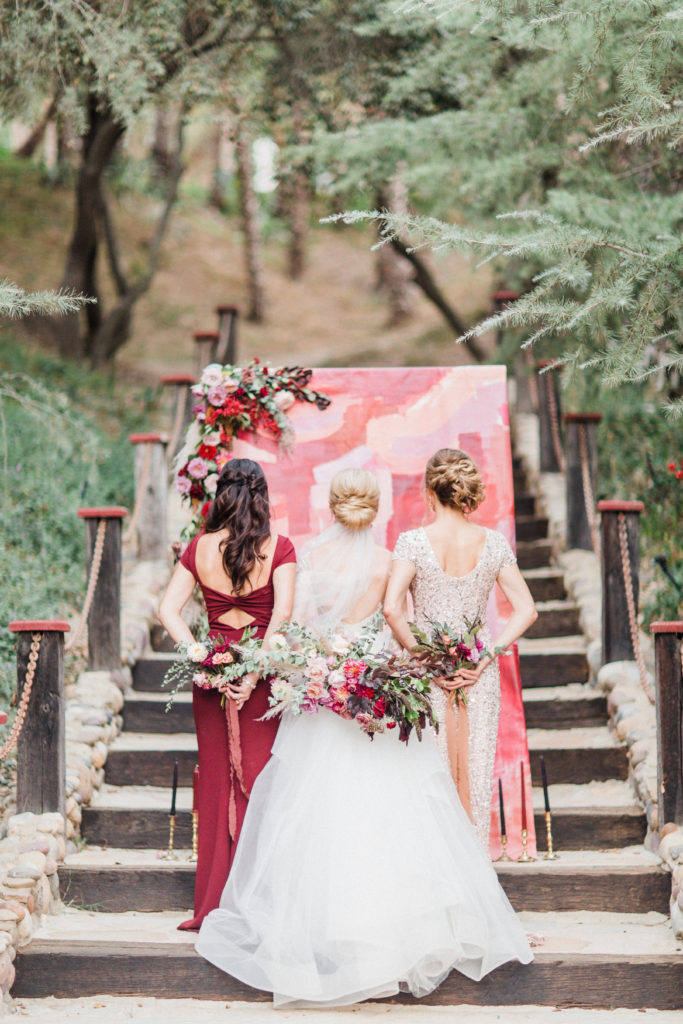 Miss Hayley Paige wedding gown with BHLDN Blush and deep red bridesmaids dresses at Rancho Las Lomas for a fall wedding