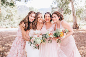 Blush and pink BHLDN Bridesmaids dresses at Triunfo Creek Vineyards in Malibu