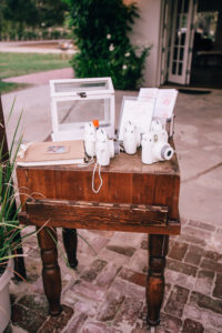 welcome table and DIY polaroids at Triunfo Creek Vineyards