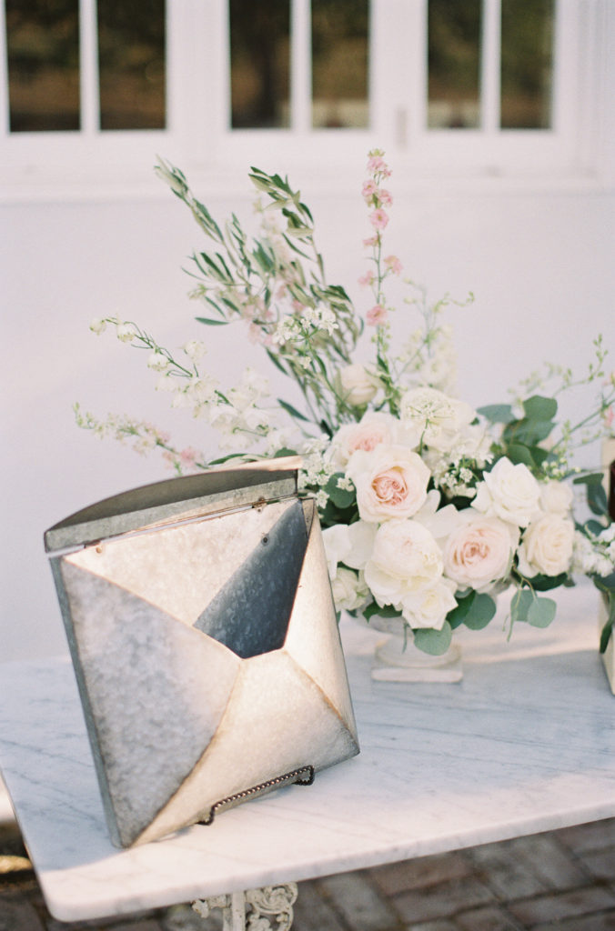 Metal cardbox and white, blush and greenery floral centerpiece