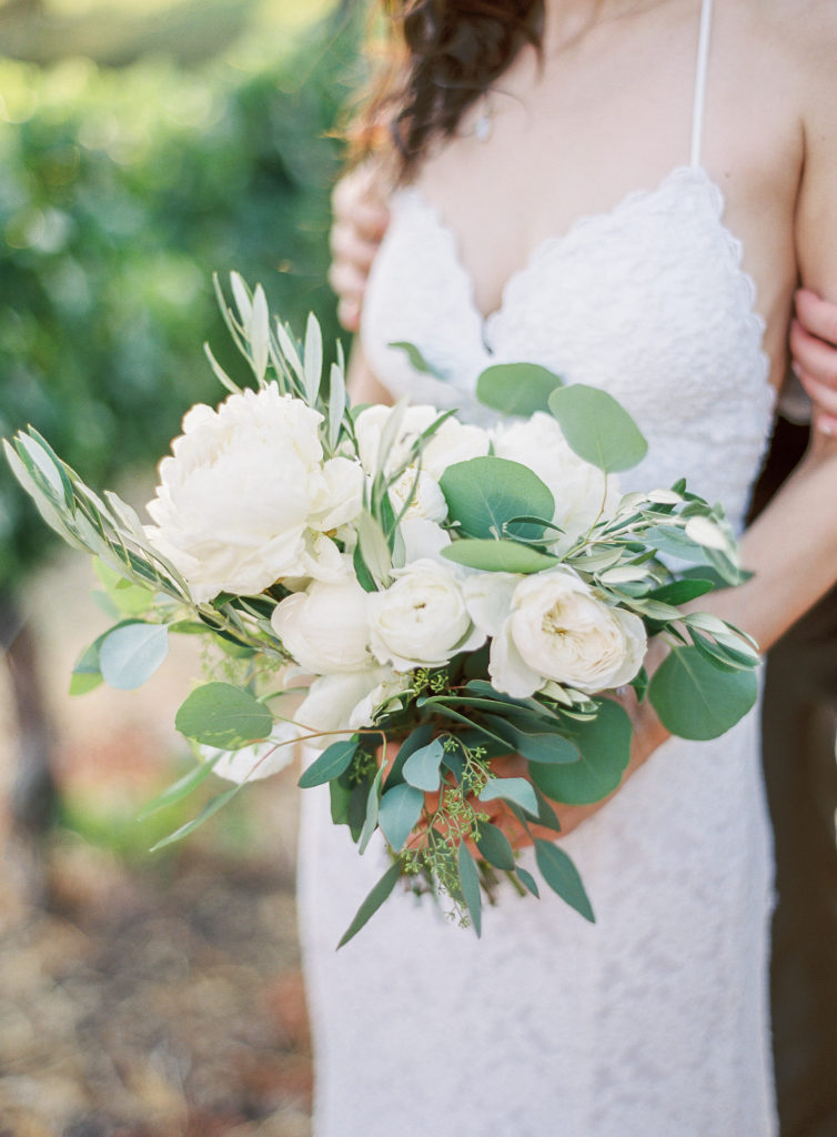white bridal bouquet with lots of greenery and eucalyptus
