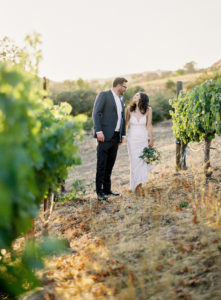 Vineyards portraits of bride and groom at Triunfo Creek Vineyards