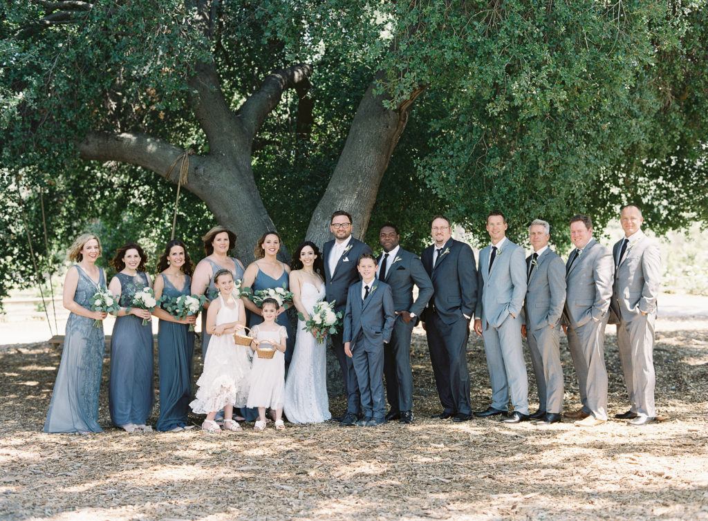 Grey color palette bridal party for dresses and tuxes