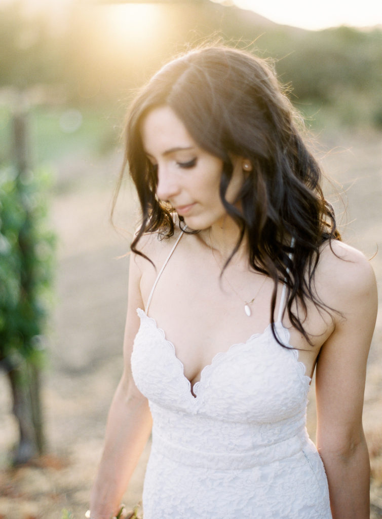Bridal portraits with a white and greenery bouquet