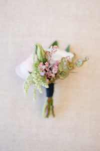 blush and navy boutonniere