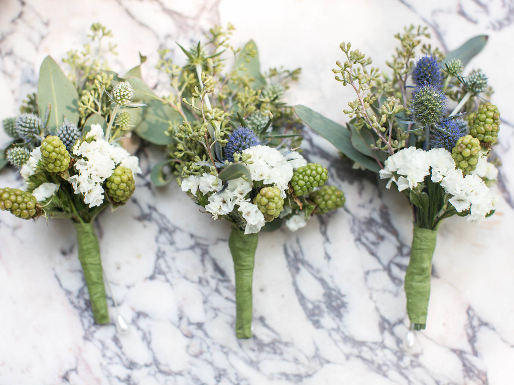 blue, green and white boutonniere