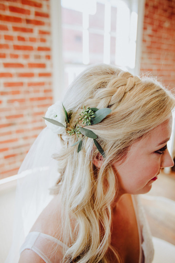 bridal hair with braid and flowers
