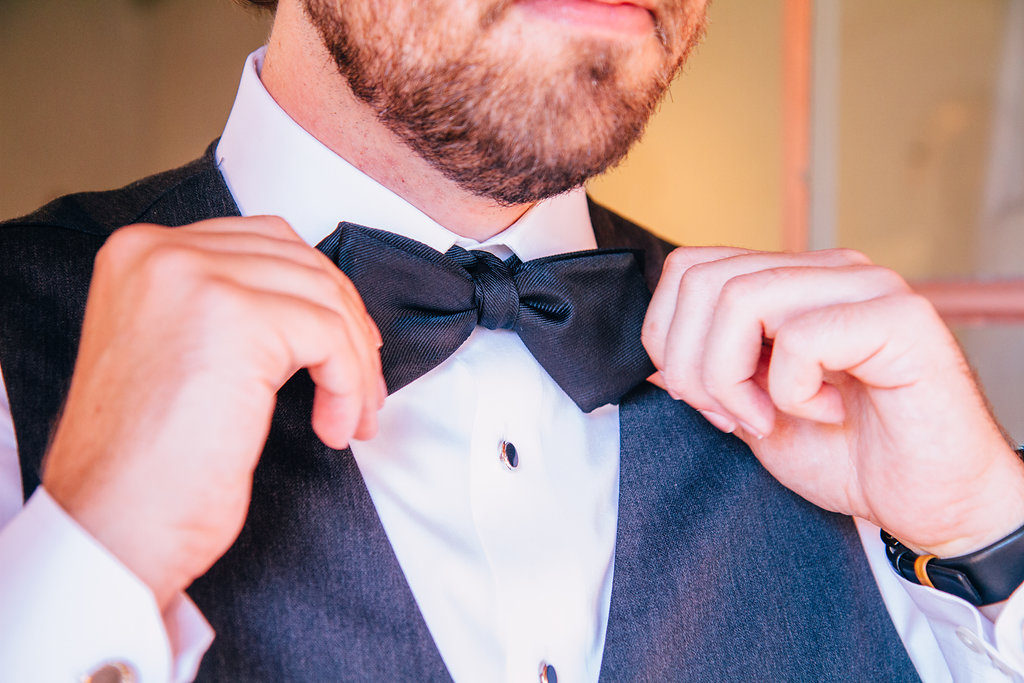 black bow tie for groom suit getting ready for wedding