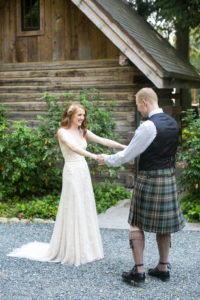 Green Gates at Flowing Lake wedding, first look, celtic inspired wedding, traditional scottish groom kilt, tartan tie, white beaded wedding dress