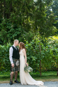 Green Gates at Flowing Lake wedding, celtic inspired wedding, traditional scottish groom kilt, tartan tie, white beaded wedding dress