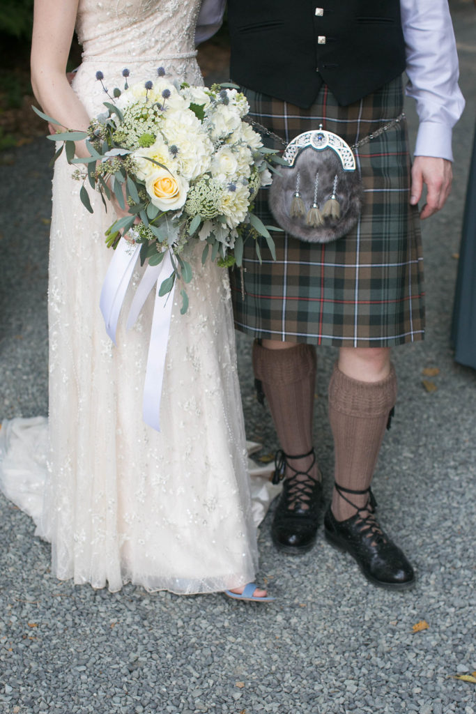 Green Gates at Flowing Lake wedding, celtic inspired wedding, traditional scottish groom kilt, tartan kilt, white beaded wedding dress, blue and white bridal bouquet