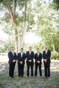 Triunfo Creek Vineyards navy groomsmen suits with blush ties