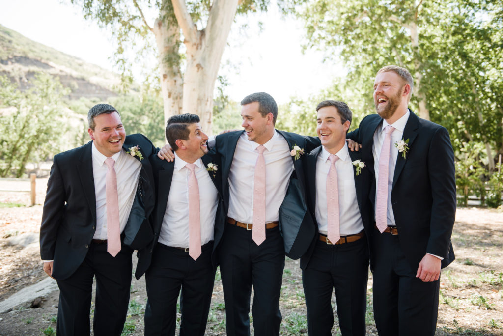 Triunfo Creek Vineyards navy groomsmen suits with blush ties